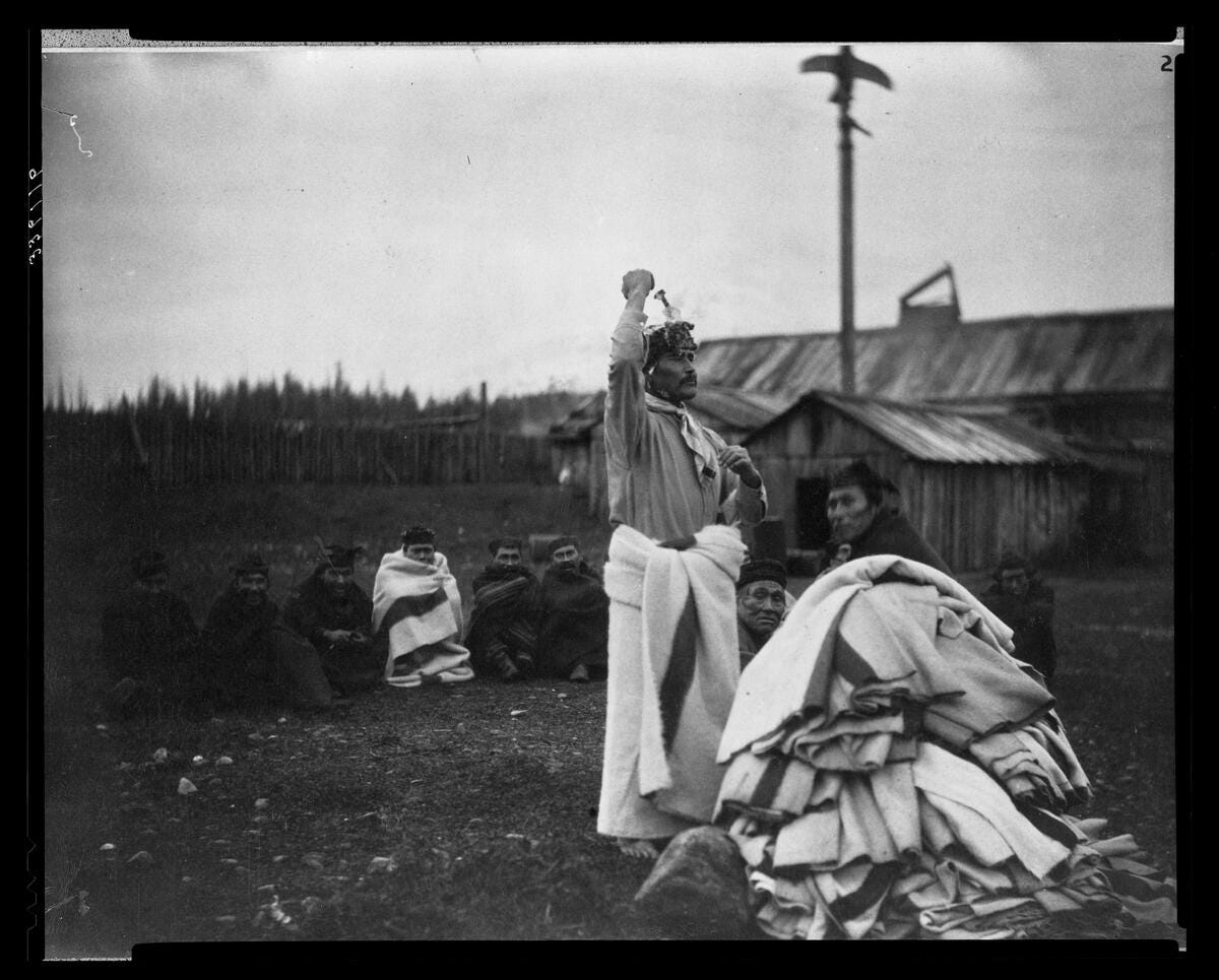 Kwakiutl potlatch of cotton blankets from the Hudson Bay company Kwakiutl potlatch of cotton blankets from the Hudson Bay company