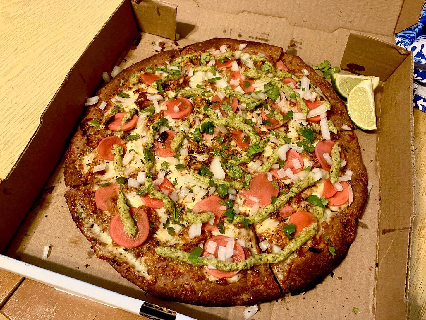 May be an image of pizza