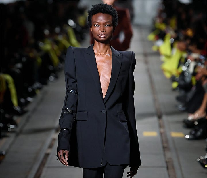 "A traditional man's frock coat is given a twist by cutting the sleeves in two sections," describes Watt. "The lower put in reverse so that the lining [is] revealed."