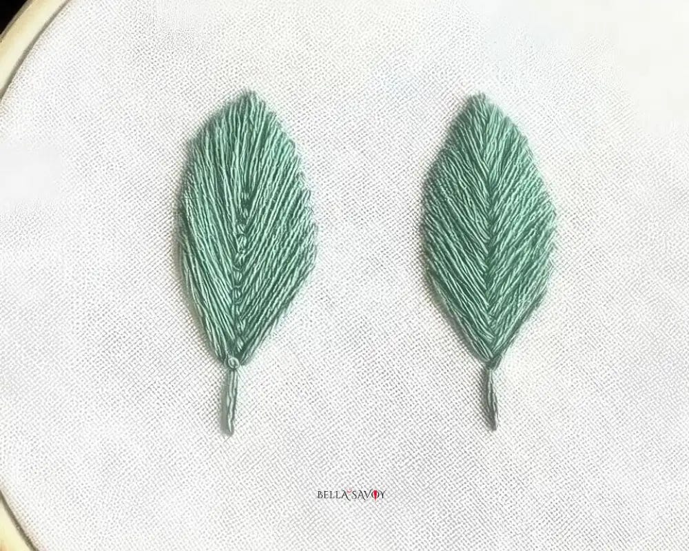comparison of embroidered leaves. Left leaf is made from the fly stitch. The right leaf is made using the fishbone stitch.