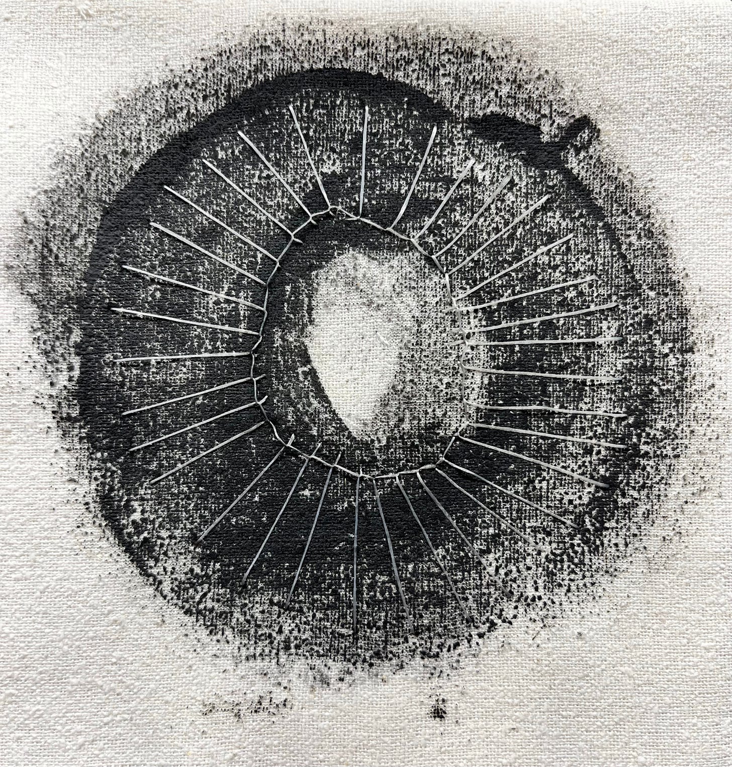 Black and white circular pattern on white silk. Black and white circular pattern on white silk.