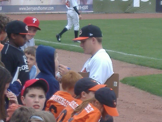 Cole McCurry has a lot of fans on this day as he signs autographs. Cole McCurry has a lot of fans on this day as he signs autographs.