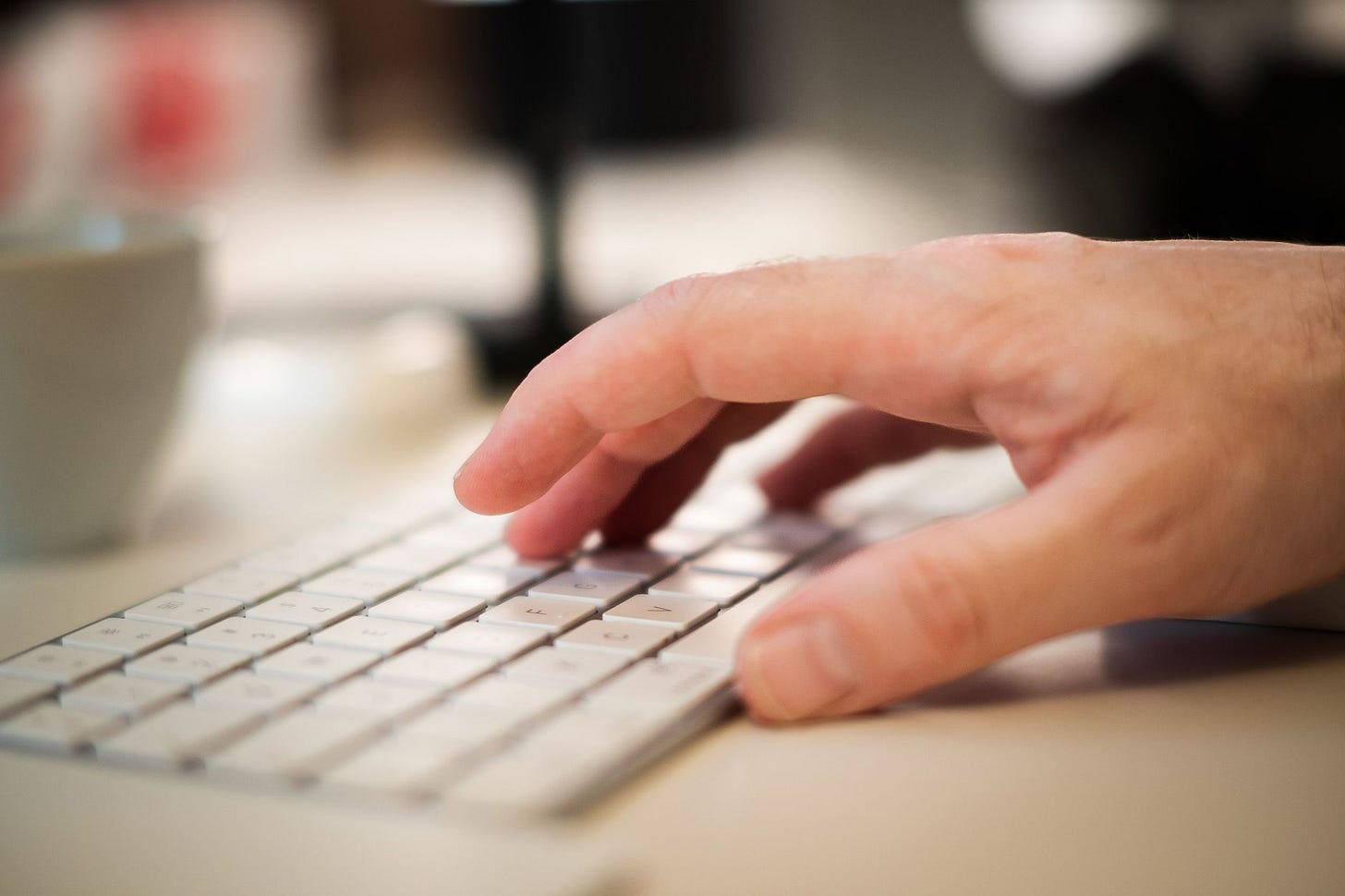 typing on keyboard in office