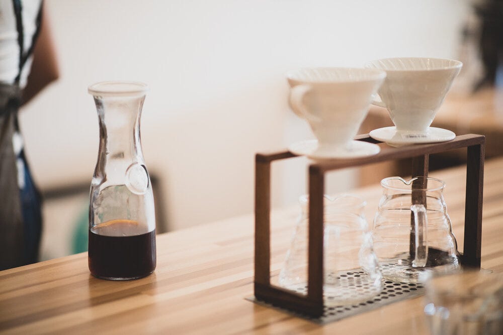 At the counter at Belux Coffee Roasters.