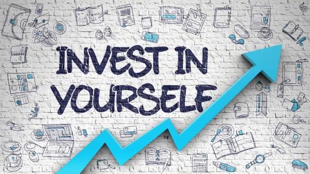 May be an image of money and text that says 'ም INVEST TIN IN YOURSELF 00二 BucKи MEL'