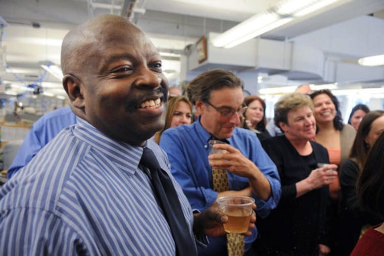 Philadelphia Daily News Editor Michael Days celebrates with the newsroom after word of the Pulitzer win. Philadelphia Daily News Editor Michael Days celebrates with the newsroom after word of the Pulitzer win.
