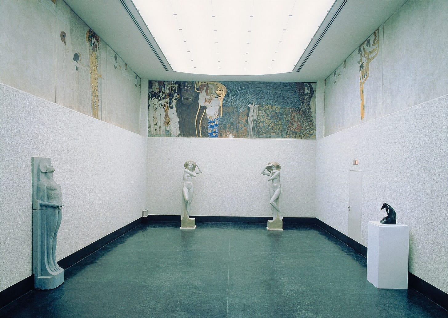 A detail from Gustav Klimt's Beethoven Frieze showing symbolic figures along a wall