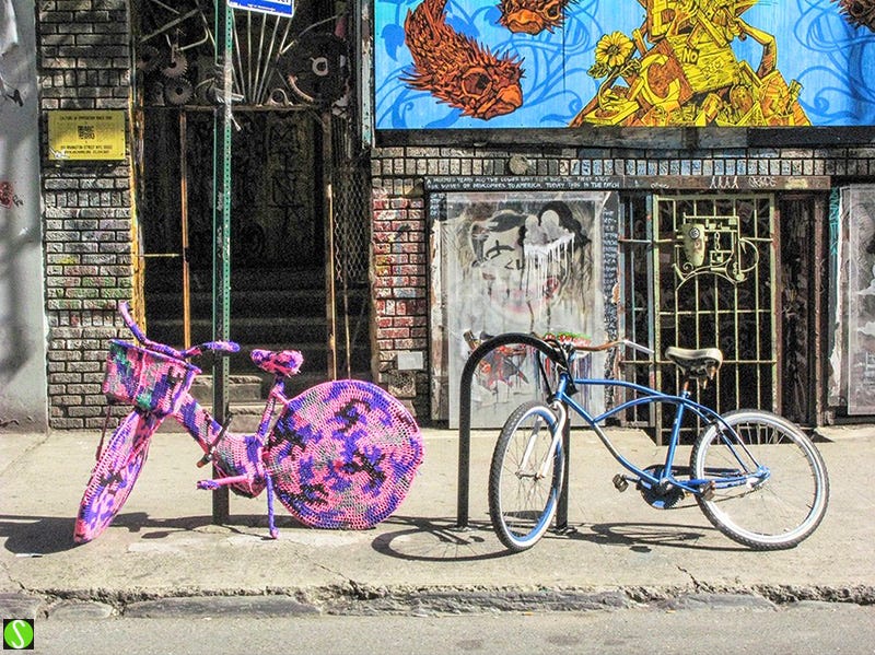 Photo by Steve Butcher of Olek crochet bicycle outside ABC No Rio on Rivington St on the Lower East Side. NYC