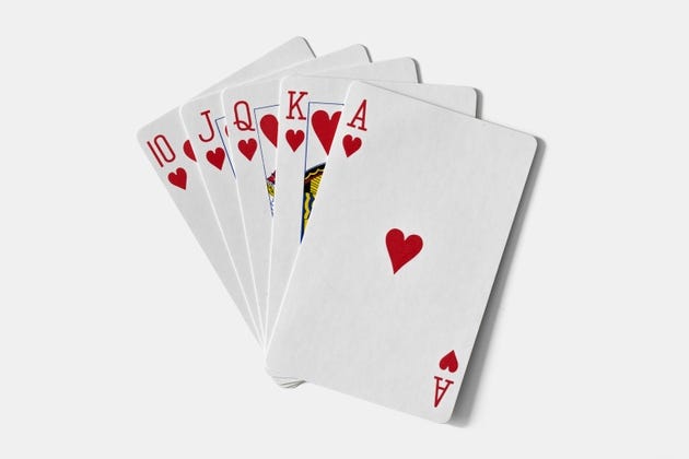 A Royal Flush in hearts, featuring the 10, Jack, Queen, King, and Ace of hearts, displayed against a white background A Royal Flush in hearts, featuring the 10, Jack, Queen, King, and Ace of hearts, displayed against a white background