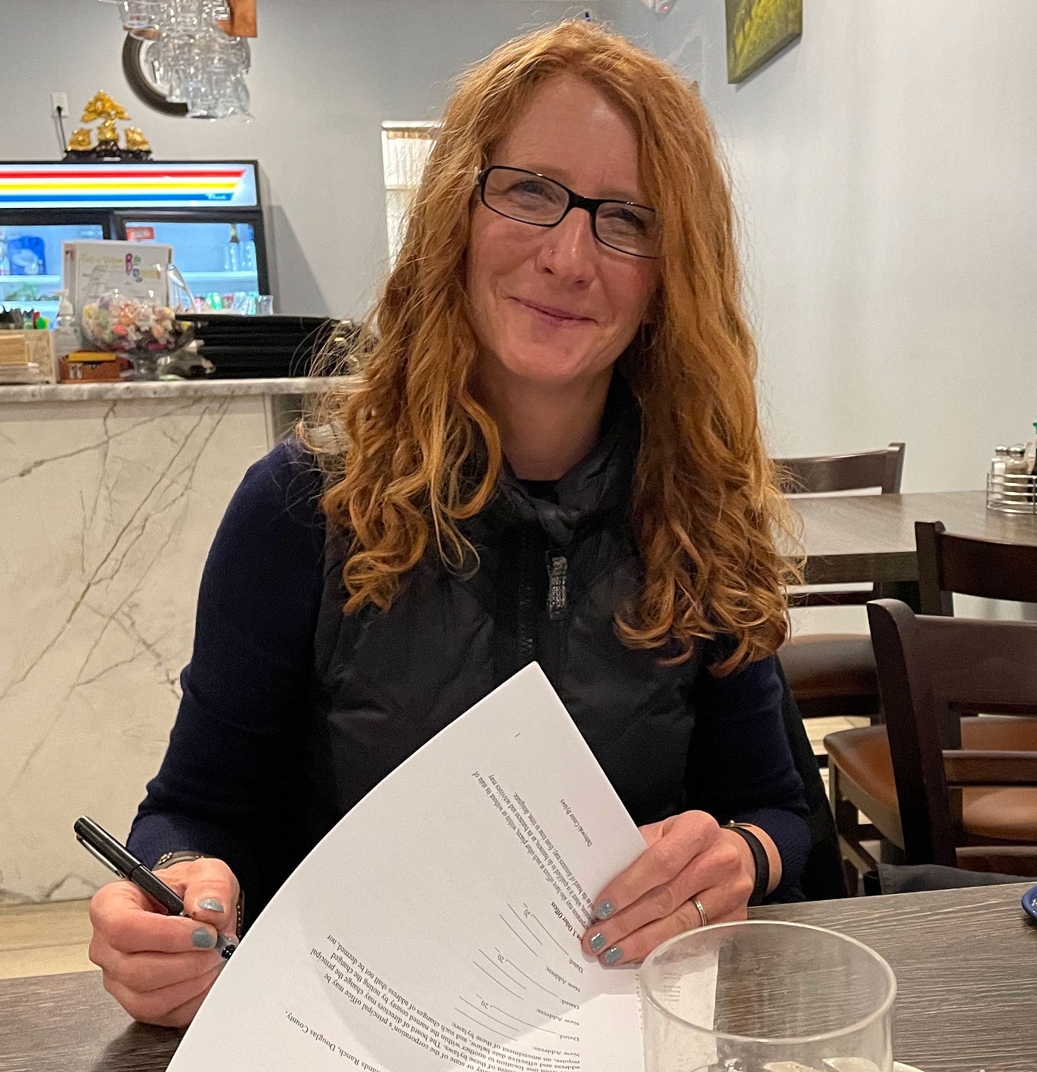 Tina signing the Dabrowski Center by-laws