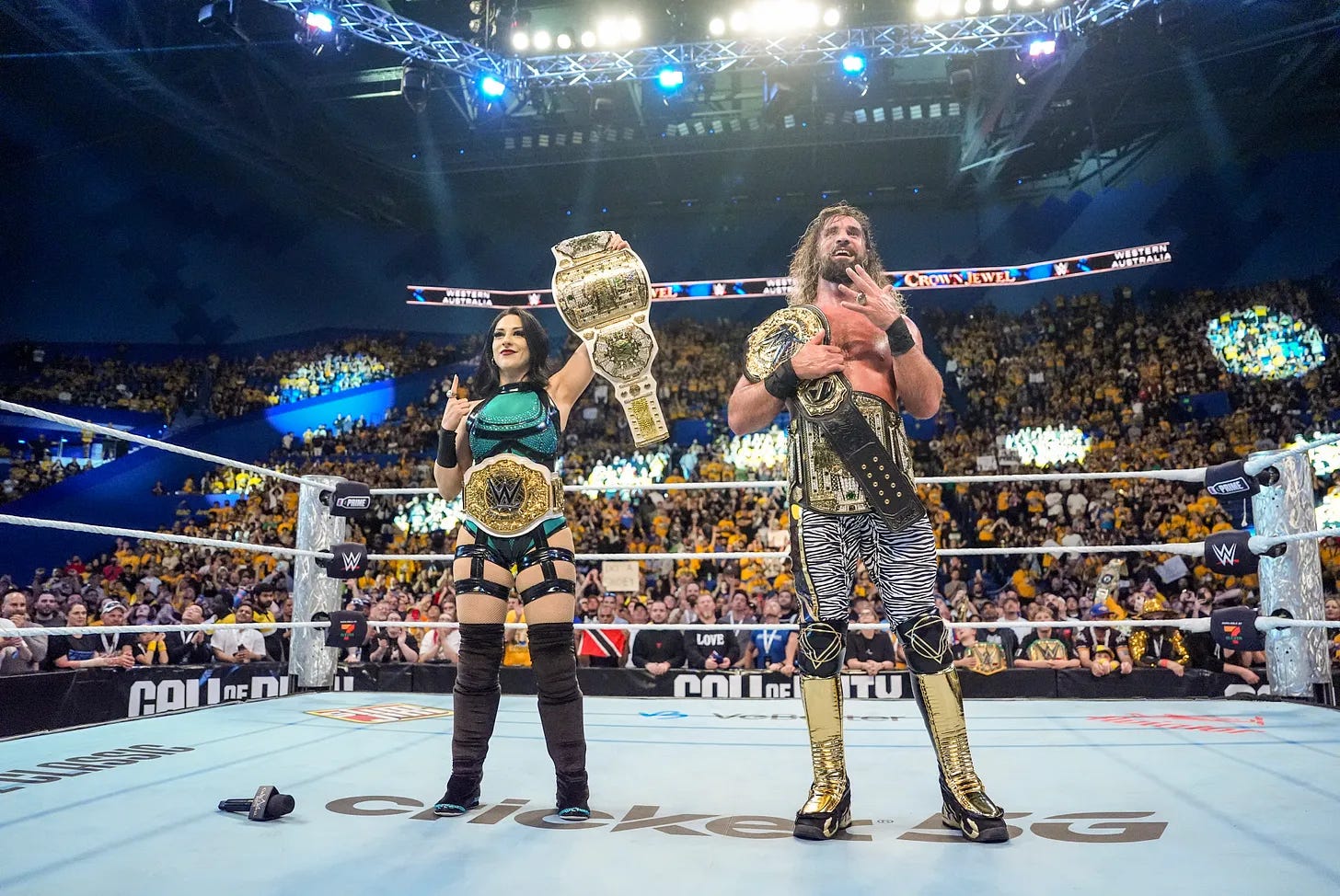 Crown Jewel champions Stephanie Vaquer and Seth Rollins celebrate in Perth Crown Jewel champions Stephanie Vaquer and Seth Rollins celebrate in Perth