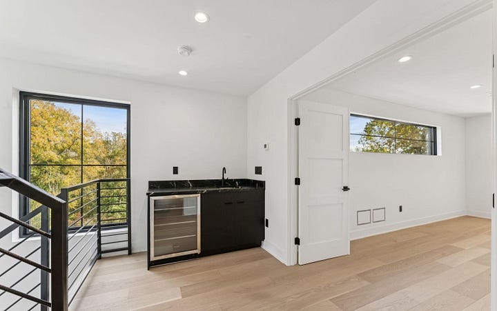 primary suite wet bar and balcony