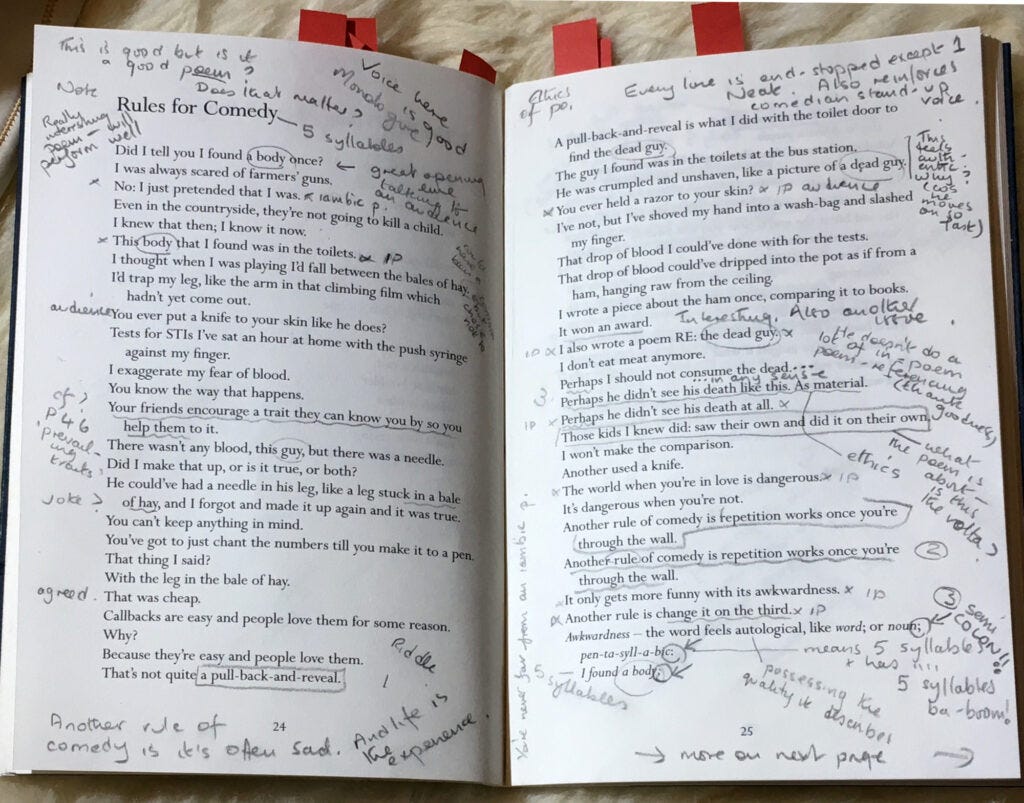 Photo of open book with notes scribbled all over it