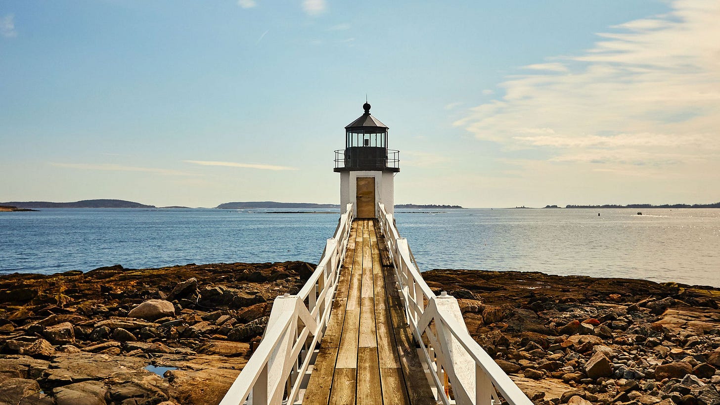 Image may contain Water Waterfront Nature Outdoors Sea Sky Scenery Shoreline Architecture Beacon and Building