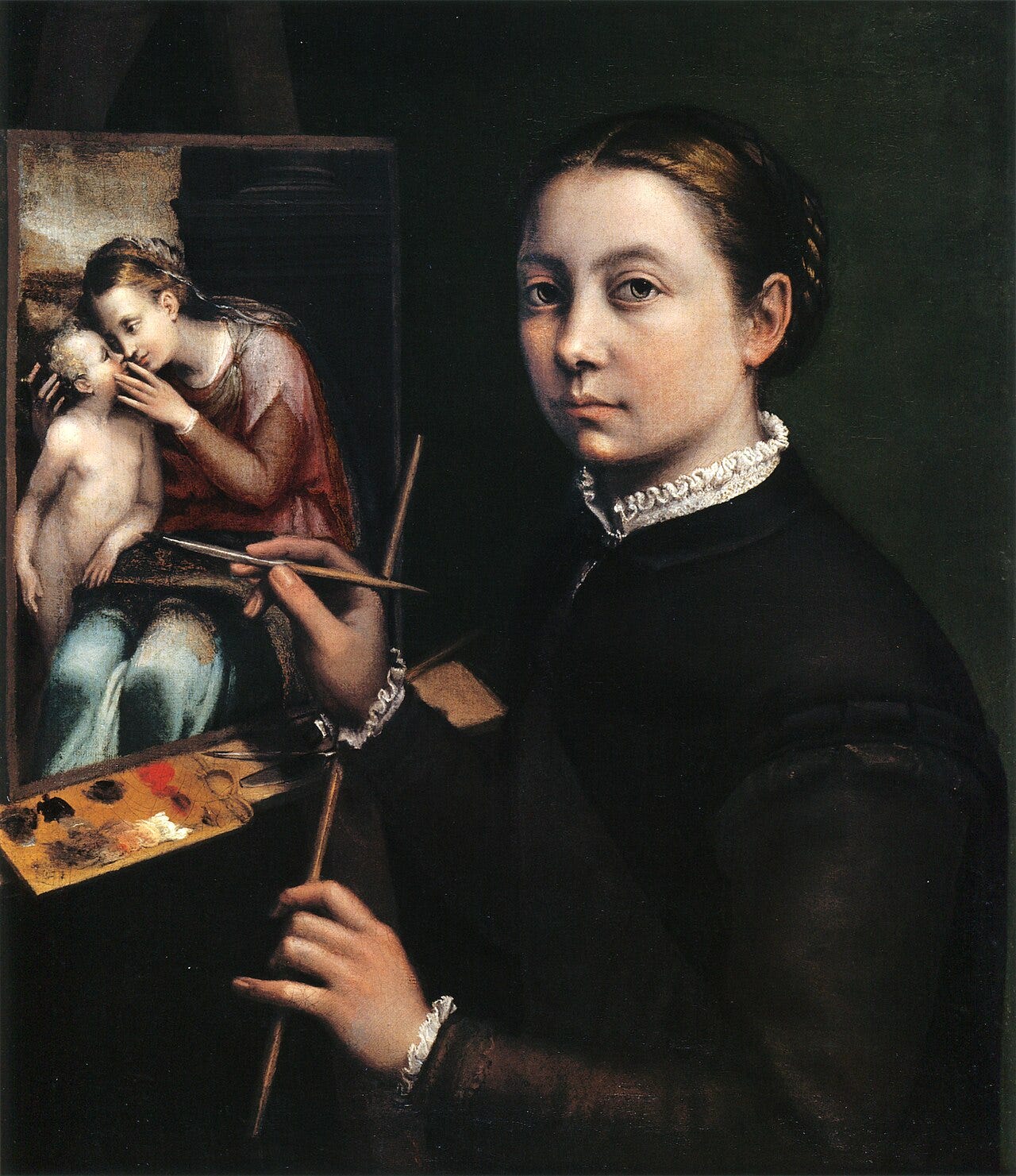 Woman painter at her easel painting a Madonna Woman painter at her easel painting a Madonna