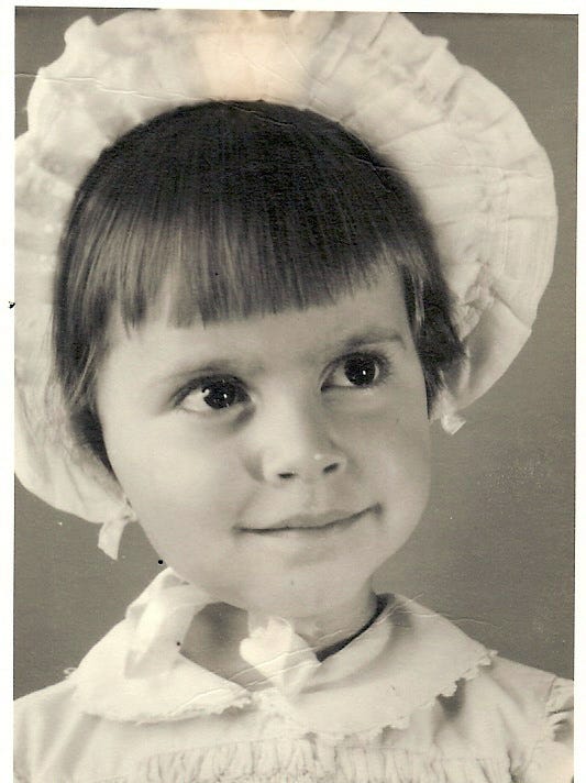 Toddler in bonnet