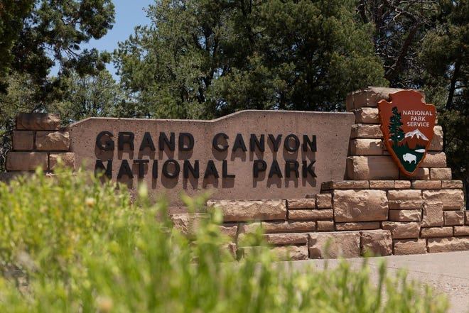 The Grand Canyon National Park welcome sign is seen from a view near Tusayan, Arizona, June 28, 2025.
