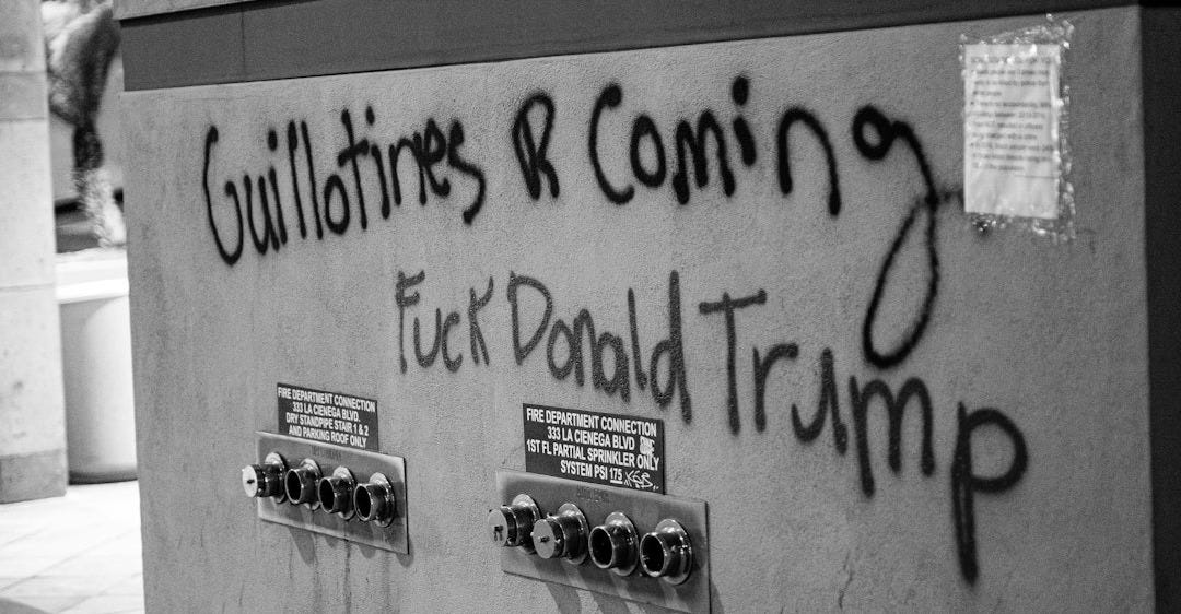 a wall with some writing on it a wall with some writing on it