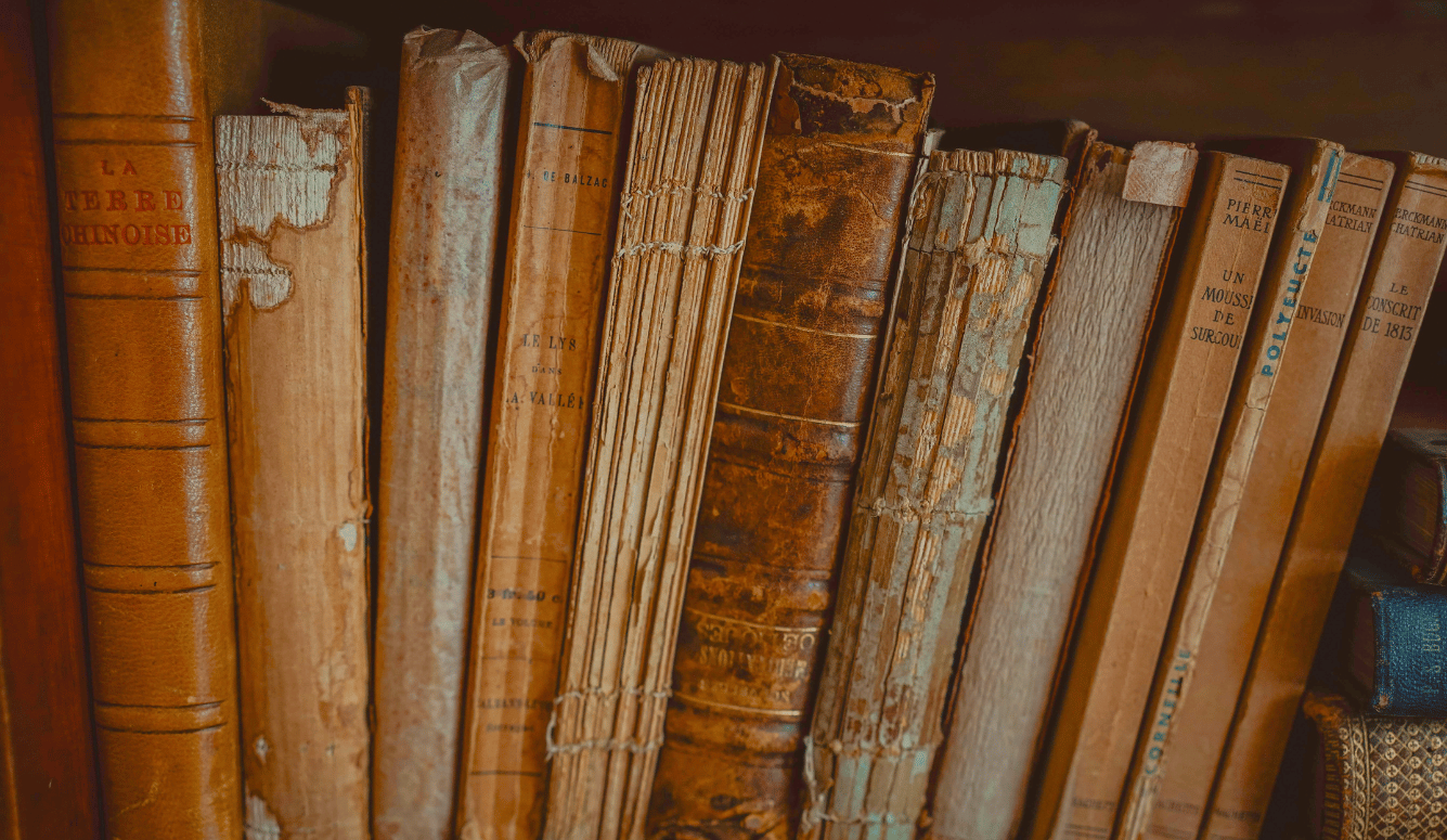 Old books with cracked spines. Old books with cracked spines.