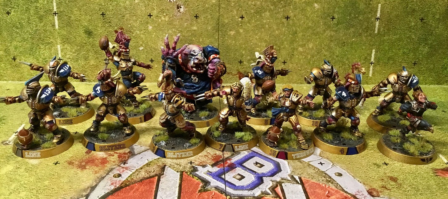 A nicely painted Blood Bowl Team on the pitch.
