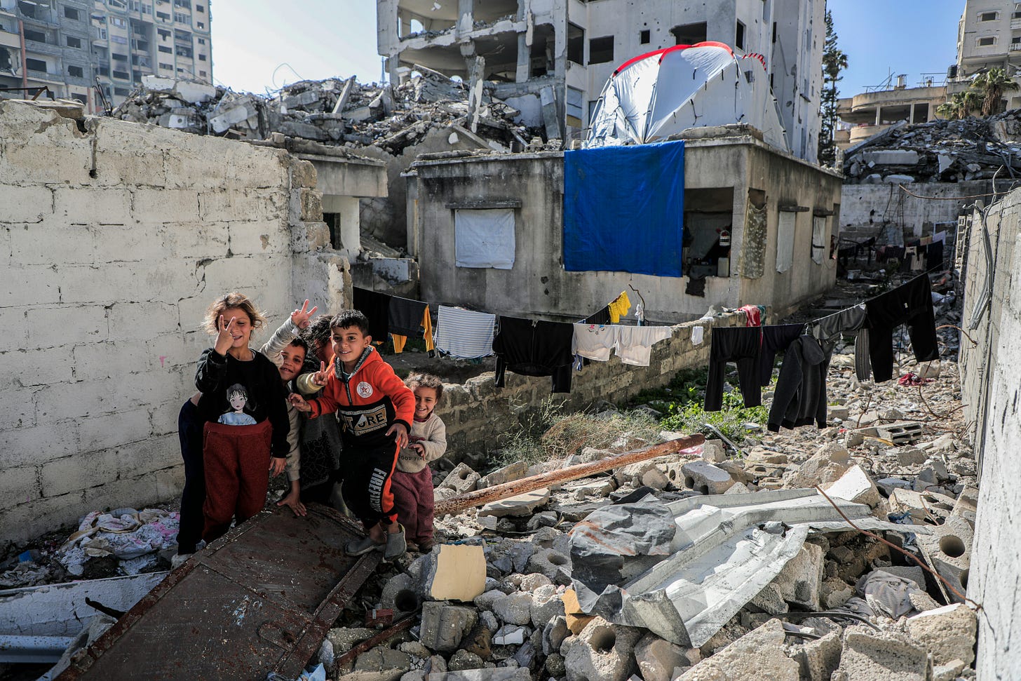 Gaza - Palestine Children among the rubble of their house. Photo credit: Mohammed Ibrahim on Unsplash. Gaza - Palestine Children among the rubble of their house. Photo credit: Mohammed Ibrahim on Unsplash.