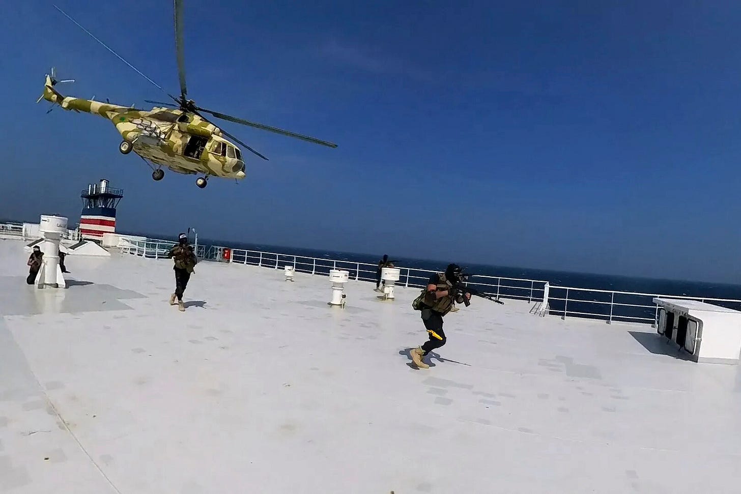 Iran-backed Yemen rebels' helicopter attack on ship raises risks in Red Sea,  analysis | AP News