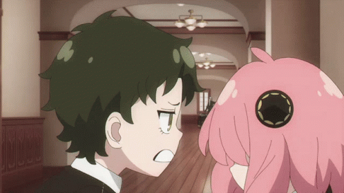 a boy and a girl are standing next to each other a boy and a girl are standing next to each other
