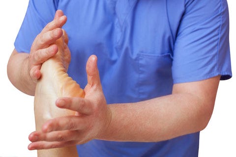 Pressing against the toes 