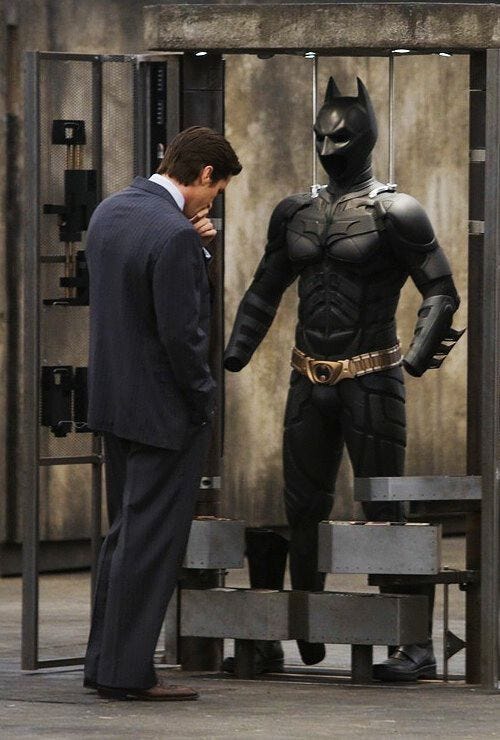 the bruce wayne front of the batsuit