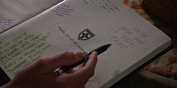 Walker Augie signing STella yearbook and sees his hot dad in there. Walker Augie signing STella yearbook and sees his hot dad in there.