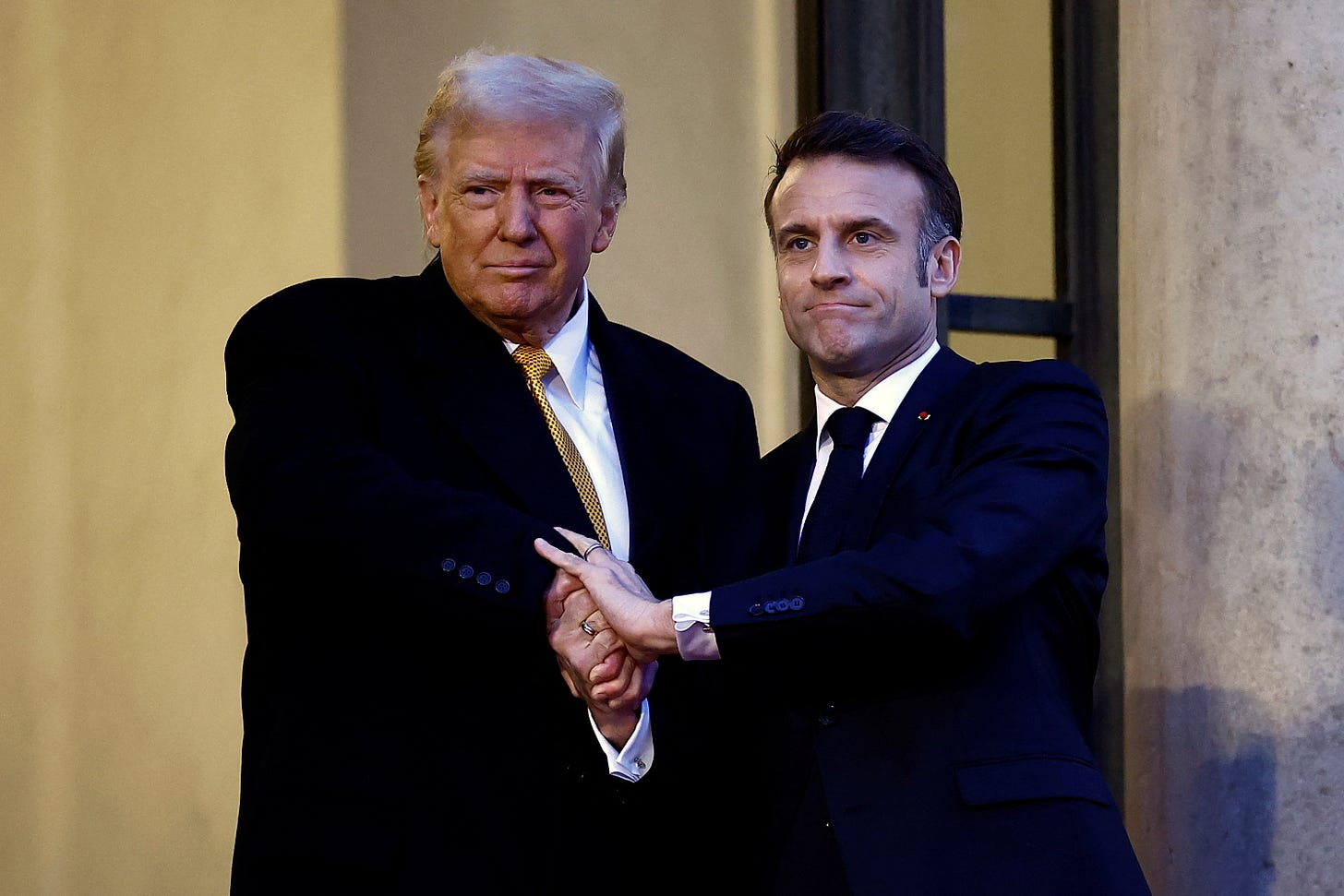 Trump and Macron can't let go of their handshake duel | Reuters