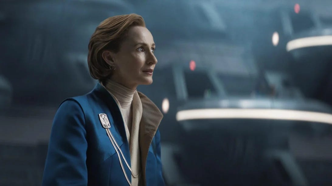Mon Mothma (Genevieve O'Reilly) stands before the Imperial Senate.