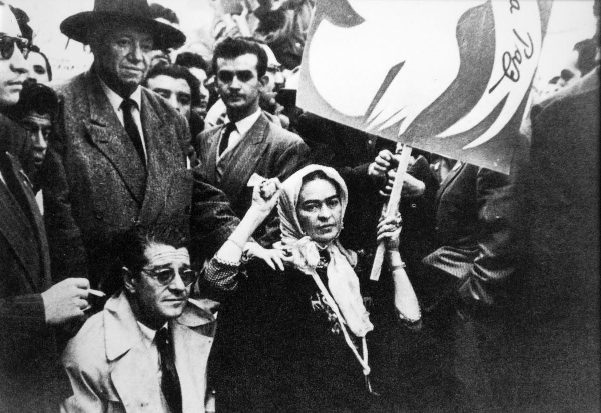 Frida Kahlo, Juan O'Gorman, and Diego Rivera in the last photograph taken of Frida before her death, at a demonstration against US intervention in Guatemala Frida Kahlo, Juan O'Gorman, and Diego Rivera in the last photograph taken of Frida before her death, at a demonstration against US intervention in Guatemala