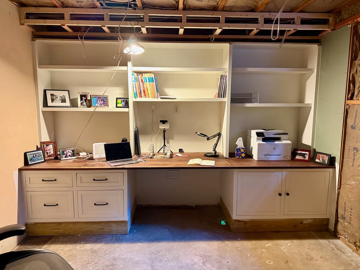 Photo of a custom build-in desk/bookshelf.