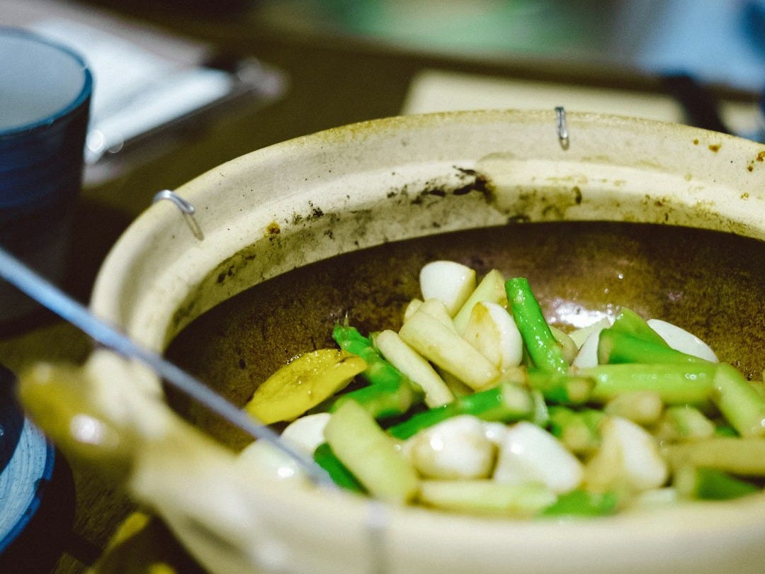 a bowl of soup with a spoon