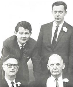 A group of men posing for a photo

AI-generated content may be incorrect.