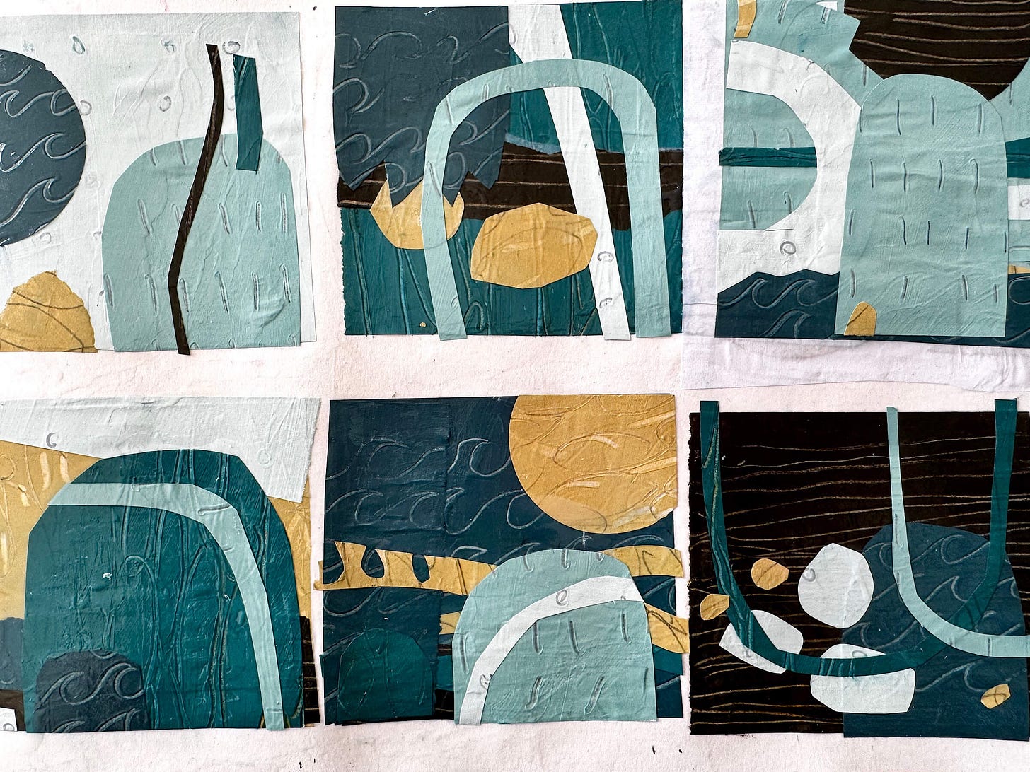 A series of six mini collages made with hand made collage paper in shades of duck egg blue, teal, sand and bark