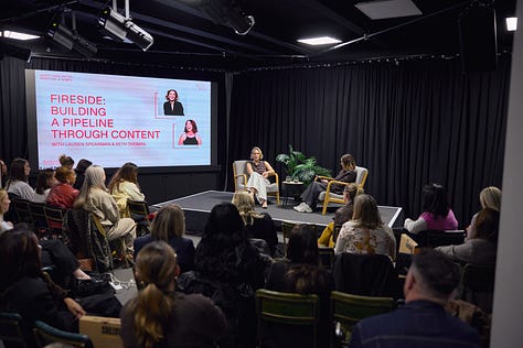 Photos of Lauren and Beth on stage at our latest Accelerator workshop, as well as photos of attendees chatting at the event.