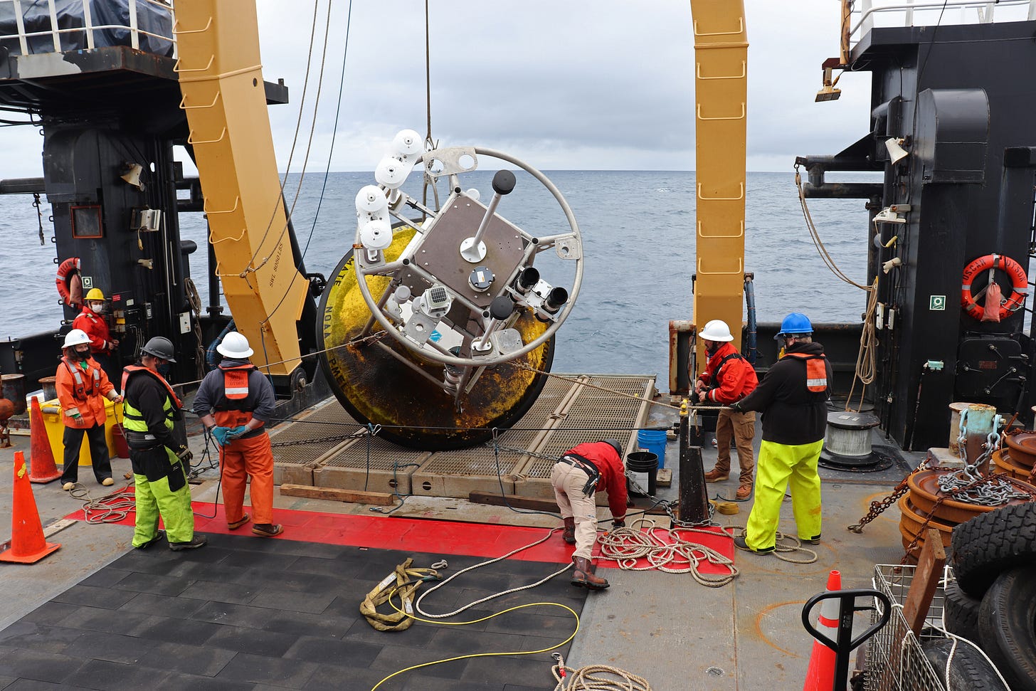 A NOAA crew retrieves an Ocean Station Papa buoy in the Gulf of Alaska. Credit: Laura Dwyer/NOAA