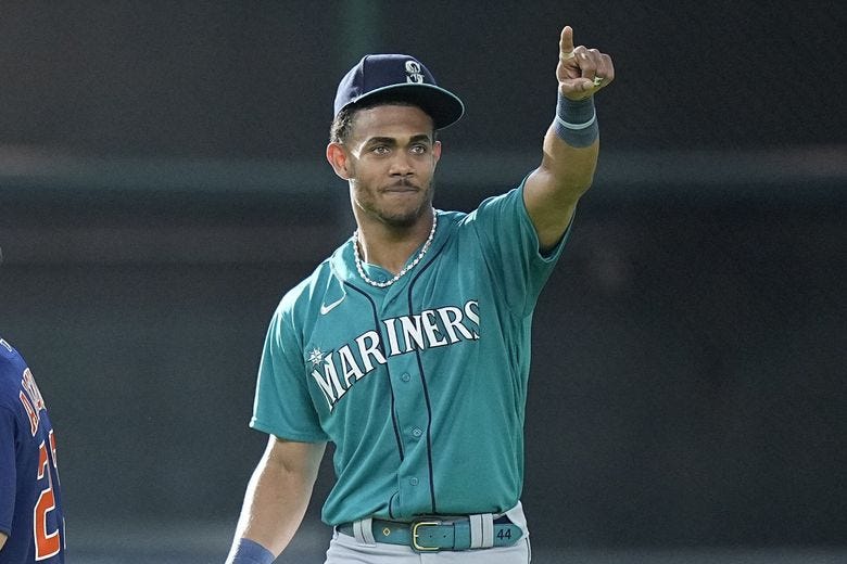 Seattle Mariners center fielder Julio Rodriguez acknowledges Houston Astros players before a baseball game, Saturday, Aug. 19, 2023, in Houston. (Kevin M. Cox / The Associated Press) Seattle Mariners center fielder Julio Rodriguez acknowledges Houston Astros players before a baseball game, Saturday, Aug. 19, 2023, in Houston. (Kevin M. Cox / The Associated Press)