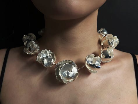 The In Trace of Every Vestige earcuff, the Broken Eggshell necklace and theIn Trace of Every Vestige necklace, by Yiran Li