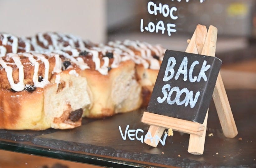 a group of pastries on a black surface