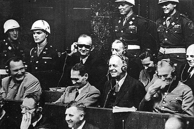 r/HistoryPorn - Former Third Reich leaders laugh at a translation error during Nuremberg trials, 1945-1946 [900x600]