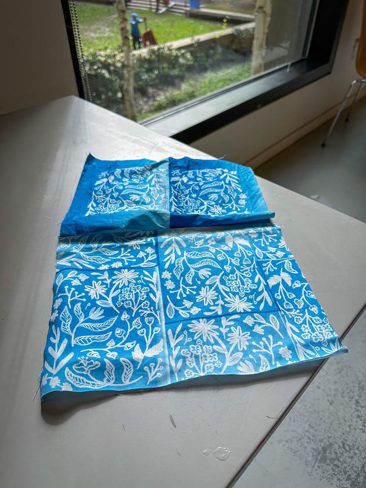 Left: Cyanotypes at the Museum of Fine Arts featuring work made by kids all over Boston! Right: A fabric cyanotype I got to make using one of my patterns