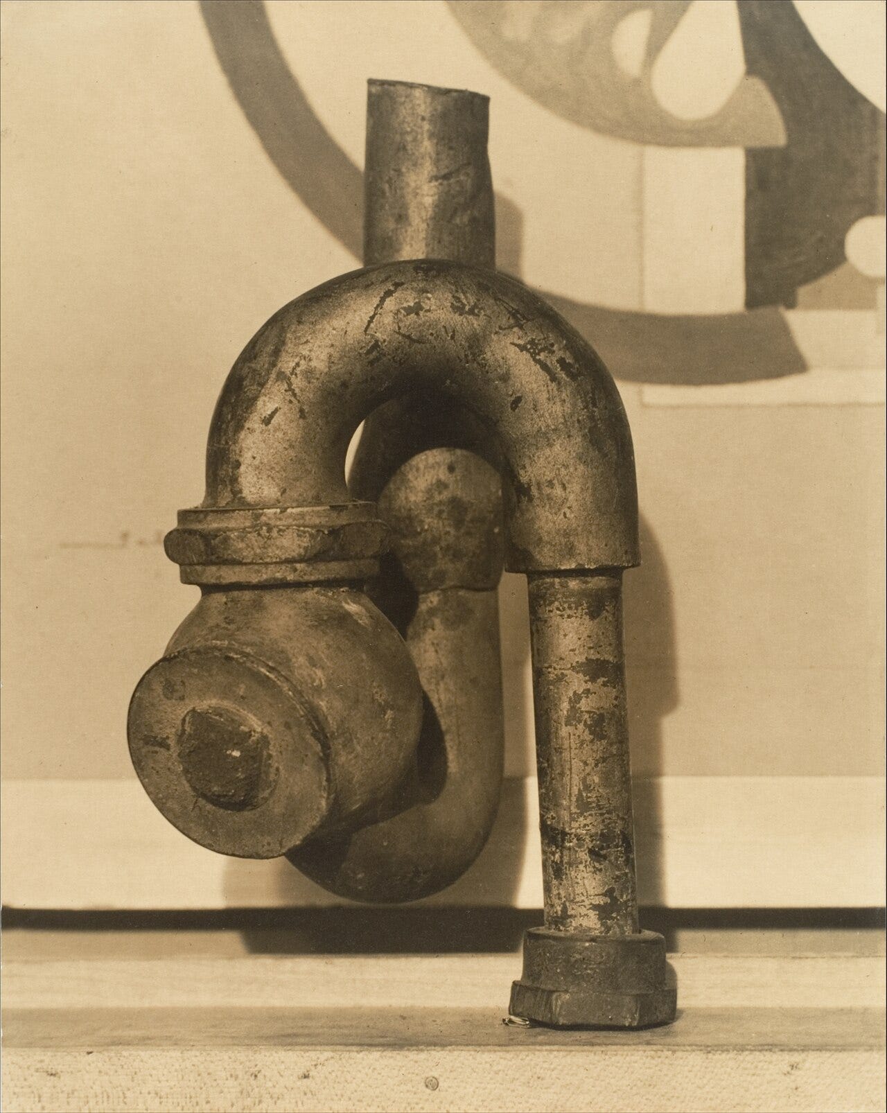 God, a cast iron plumbing trap mounted on a wooden miter box, around 1917 God, a cast iron plumbing trap mounted on a wooden miter box, around 1917
