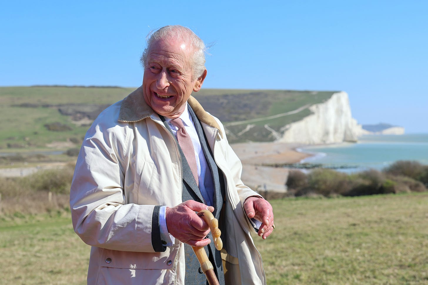 King Charles smiles on the seven sisters cliff