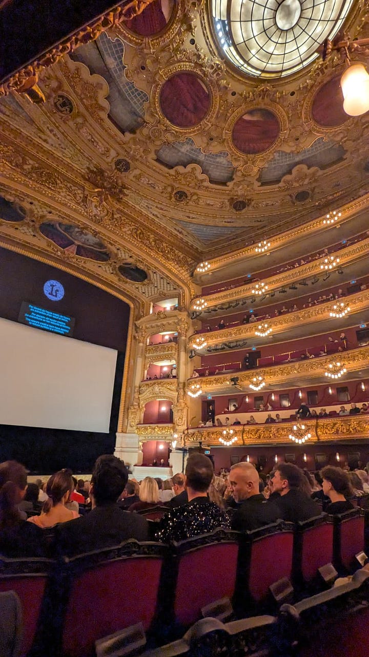 Photo 1: A photograph of a painting exhibited in Barcelona, showing layered visual elements and textural details. Photo 2: The interior of the Gran Teatre del Liceu in Barcelona, showing its historic architecture and seating.