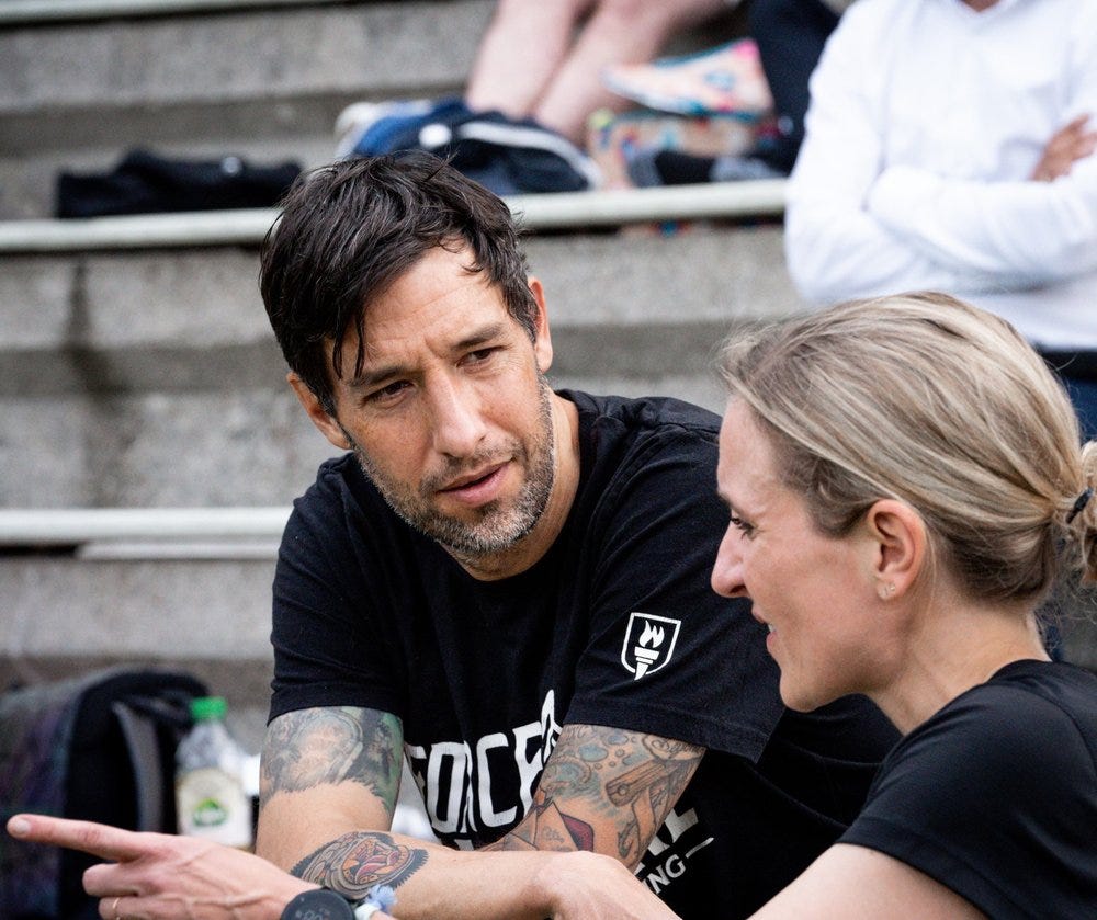 Two runners discussing
