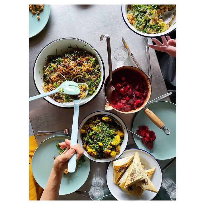 A series of 4 images of various salads taken from above
