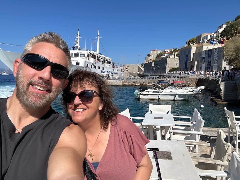 May be an image of 2 people, boat, Santorini and Camogli